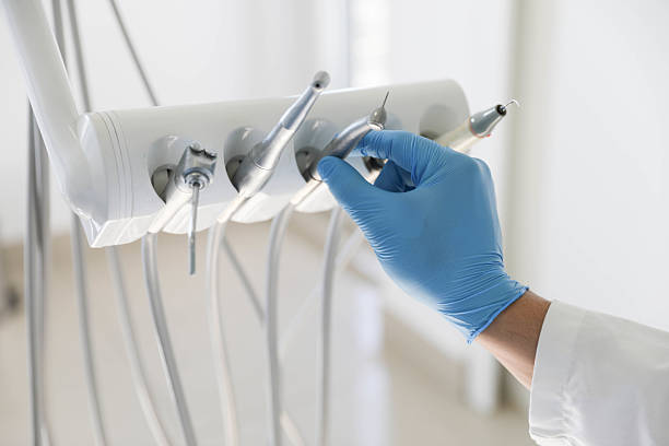Professional Teeth Whitening technician working in Raynham Center, MA